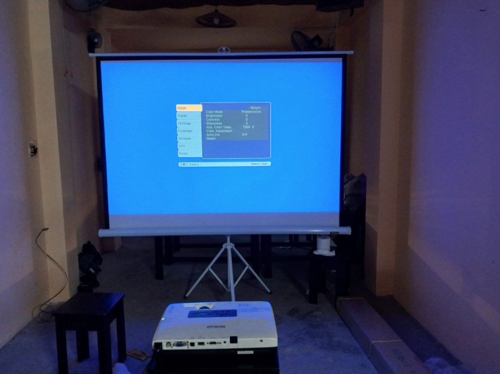 How Far Should a Projector Be From the Screen?